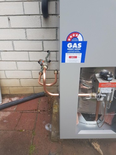 Plumber installs a new hot water system in Coburg