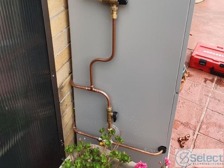New hot water system installed by plumber in Gladstone Park